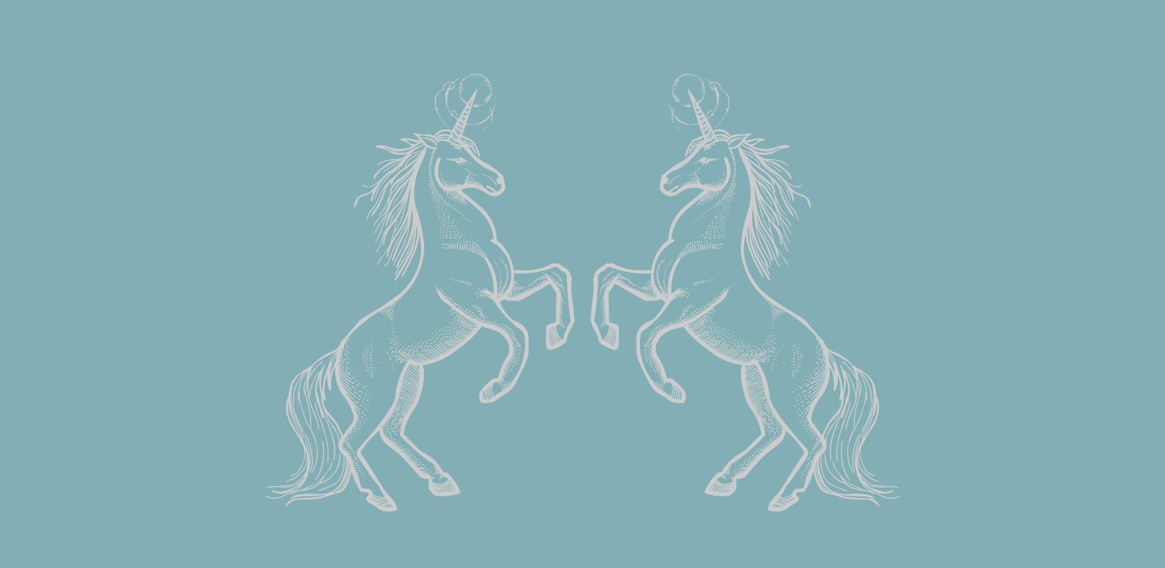 two unicorns facing each other