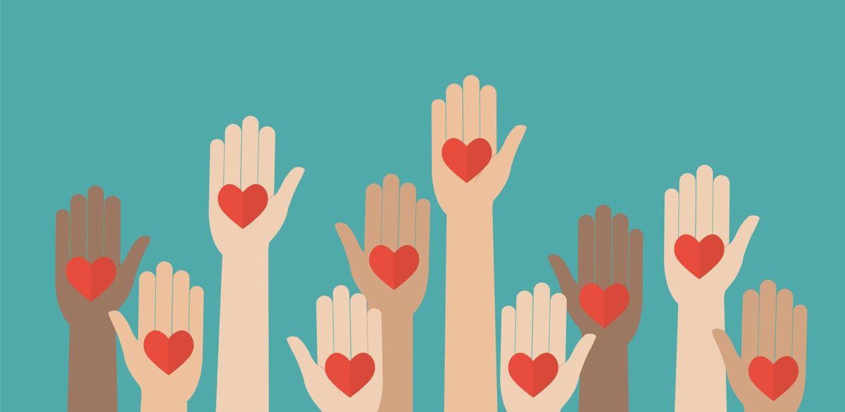 Illustration of many raised hands holding heart symbols